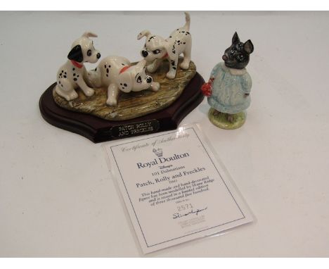 A Beswick Beatrix Potter figure Pig-Wig, together with a Royal Doulton limited edition Disney's 101 Dalmations figural group 
