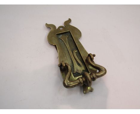 An Art Nouveau brass door knocker and sprung letter box plate, Classic Nouveau flower engraved, Circa 1900's