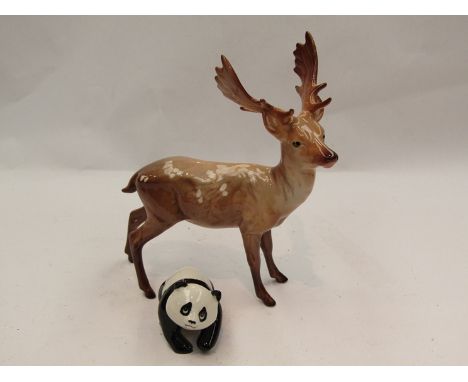 A Beswick figure of a Panda cub, model no 1815, together with a Beswick Stag - standing, in light brown gloss, model no 981