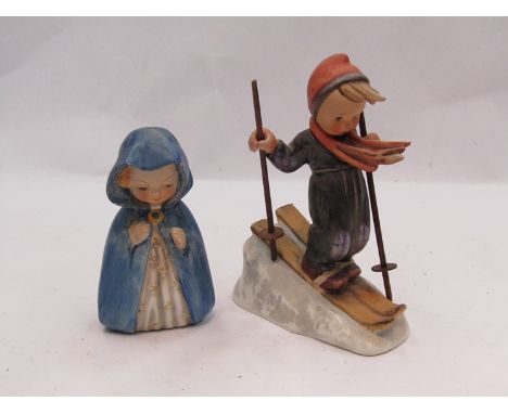 A Goebel Hummel figure of a Skier boy on slope, model no 59, together with a Hummel figure Mary, model no rob 413A