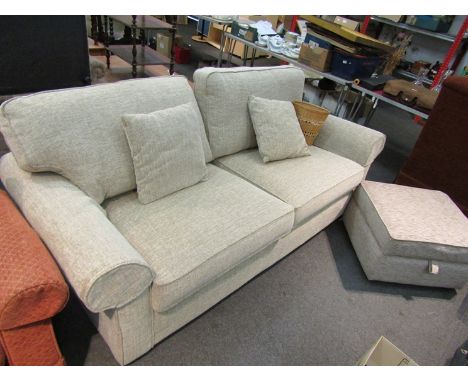 A John Doe, sofa bed and footstool, in oatmeal coloured upholstery  