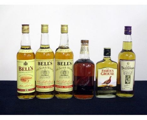 1 70-cl Bells 8YO Extra Special Old Scotch Whisky 2 75-cl bts Bells Extra Special Old Scotch Whisky 1 70-cl The Naked Grouse 