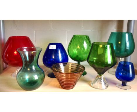 A collection of European coloured glass pieces including brandy balloons and textured art glass. (7)