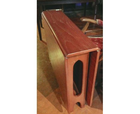 A decorative small drop leaf table in the Art Deco style. H43 x W63 x D42cm.