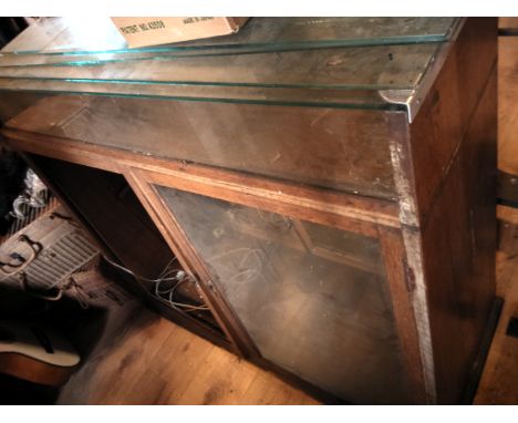 Shop Display counter and cabinet cir 1900s, with gold lettering spelling Cash and Receipts, glass shelves and internal lighti