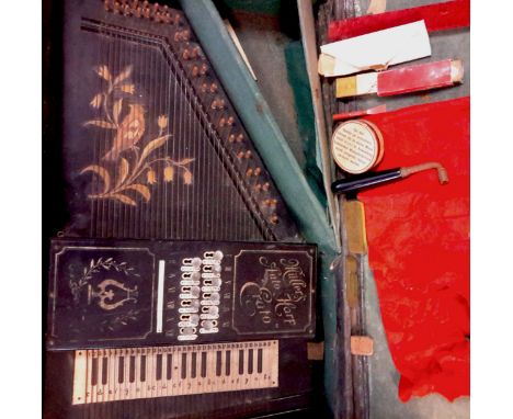 A German Auto-Harp by Mullers in original box.