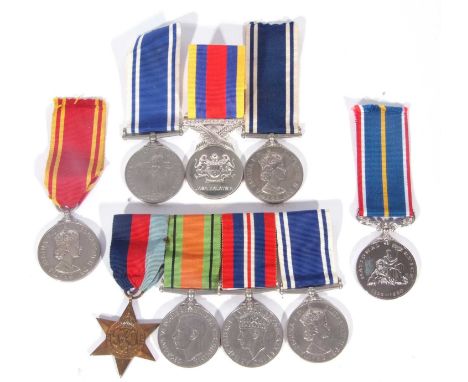 Set of 4 WWII / Post-war British medals to include 1939-45 star, defence medal, 1939-45 war medal Police Service medal ERII t