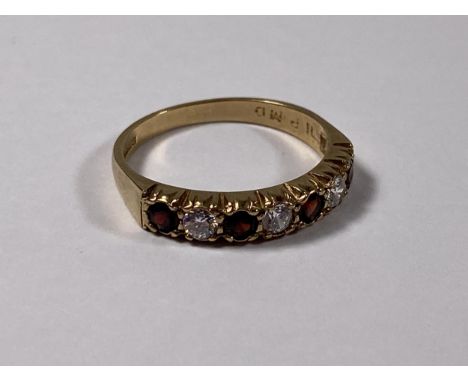 A 9CT GOLD RED &amp; CZ STONE RING, WEIGHT 2.1G 