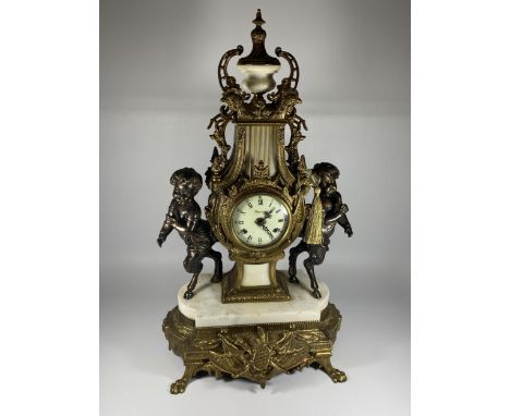 A C.1900 ITALIAN REPRODUCTION MANTLE CLOCK BY IMPERIAL IN BRASS WITH MARBLE BASE AND CHERUBS, HEIGHT 61CM 