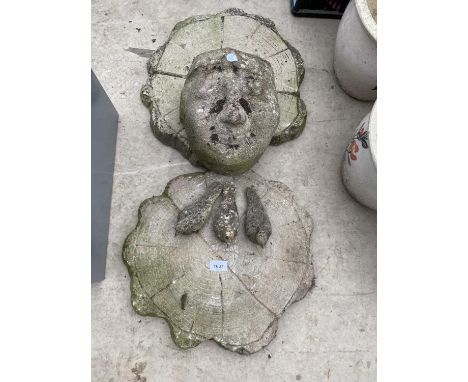 AN ASSORTMENT OF RECONSTITUTED STONE ITEMS TO INCLUDE A FACE PLANTER, THREE DOVES AND TWO LOG RINGS ETC 