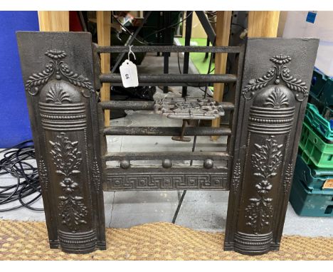 A VINTAGE CAST METAL FIREPLACE INSERT 