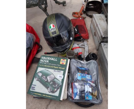 AN ASSORTMENT OF ITEMS TO INCLUDE AN AGV MOTORBIKE HELMET, A HAYNES MANUAL AND A TANKARD ETC 