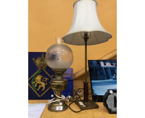 TWO LAMPS TO INCLUDE A BRASS OIL LAMP WITH GLASS FUNNEL AND SHADE AND A FRUTHER MODERN LAMP 