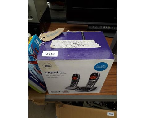 A PAIR OF BOXED BIG BUTTON HOUSE PHONES 