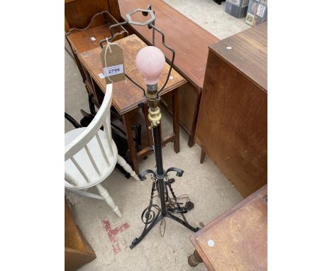 AN ART NOUVEAU WROUGHT IRON AND COPPER ADJUSTABLE STANDARD LAMP, CONVERTED TO ELECTRICITY 