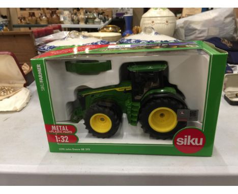 A BOXED SIKU MODEL OF A JOHN DEERE 8R- 370 TRACTOR REF NO 43329 SCALE 1:32 