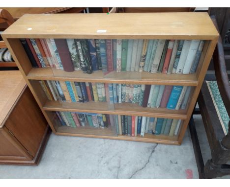 A MID 20TH CENTURY LIGHT OAK ODHAMS SOLIDA BOOKCASE WITH SIX SLIDING GLASS DOORS 36" WIDE TO INCLUDE A QUANTITY OF BOOKS 