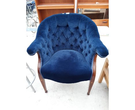 AN EDWARDIAN MAHOGANY AND INLAID TUB CHAIR WITH SWEPT ARMS AND BUTTON BACK 