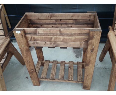 AN AS NEW EX DISPLAY CHARLES TAYLOR TALL TROUGH PLANTER *PLEASE NOTE VAT TO BE CHARGED ON THIS ITEM* 