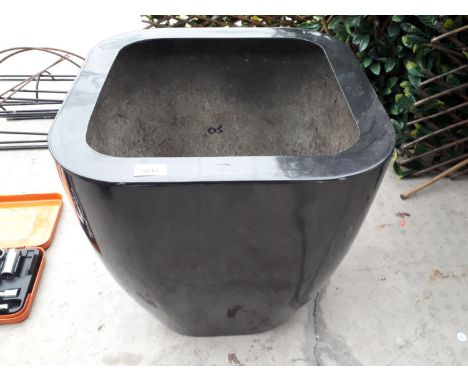 A BLACK FIBRE GLASS PLANTER (H:48CM) 