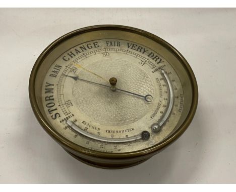 A VINTAGE BRASS SHIPS BAROMETER 