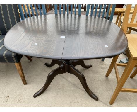 AN 'ERCOL CHESTER' ELM EXTENDING DINING TABLE ON PEDESTAL BASE, 41X35" (LEAF 17.5") 