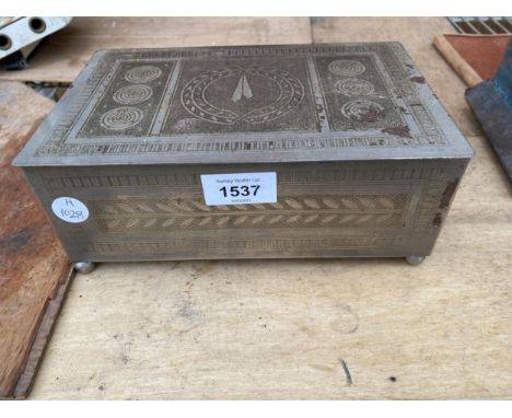 AN ENGINE TURNED BOX CONTAINING AN ASSORTMENT OF CIGARETTE CARDS 