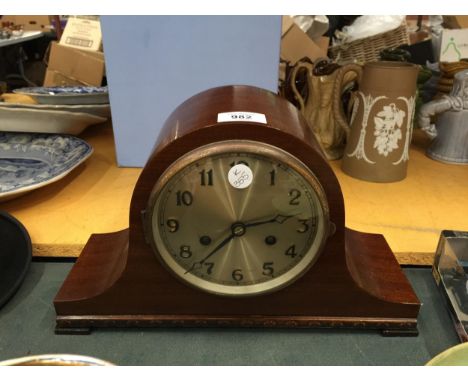 A NELSONS HAT STYLE MAHOGANY MANTLE CLOCK 
