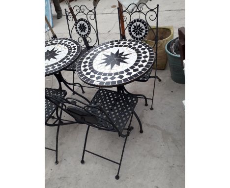 A ROUND TILE TOP BISTRO TABLE AND TWO FOLDING CHAIRS WITH TILED BACKS 