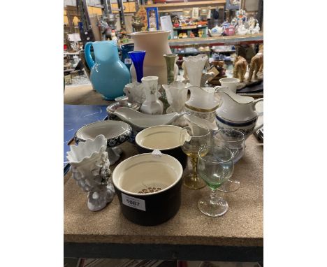 A QUANTITY OF CERAMIC JUGS AND VASES TO INCLUDE DOULTON, COALPORT ETC 