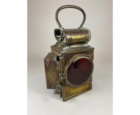 A VINTAGE BRASS RAILWAY LANTERN 