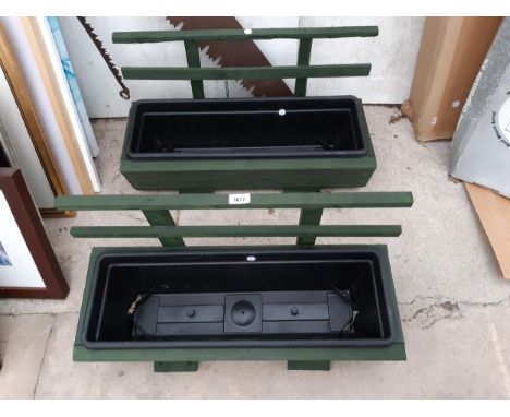 TWO WOODEN TROUGH PLANTERS WITH PLASTIC INSERTS AND TRELIS BACK 