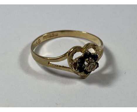 A 9CT GOLD DIAMOND AND SAPPHIRE HEART SHAPED RING, WEIGHT 1.3G 