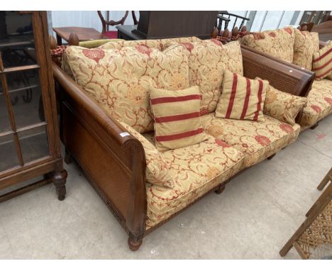 A 'MULTIYORK' HARDWOOD KNOLE DROP-SIDED SOFA WITH BERGERE ENDS, ON TURNED FRONT LEGS 