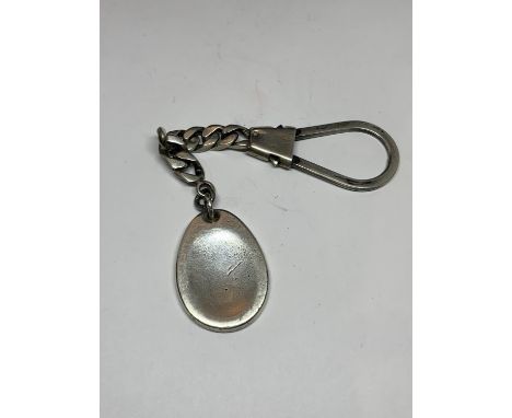A TIFFANY GOLFERS REST KEY RING 