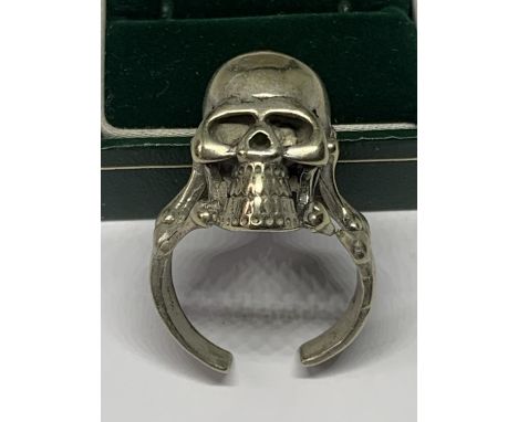 A SILVER SKULL RING IN A PRESENTATION BOX 