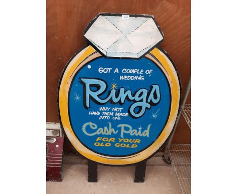 A WOODEN HAND PAINTED RING ADVERTISING SIGN 