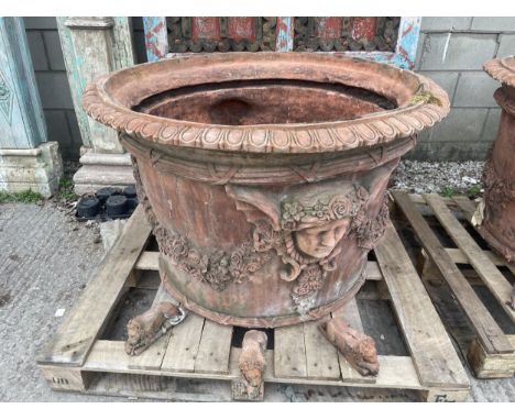 A LARGE TERRACOTTA PLANTER FEATURING A BUST OF GREEK GOD HERMES - COMES COMPLETE WITH THREE LION FIGURE RESTS - HEIGHT (WITHO