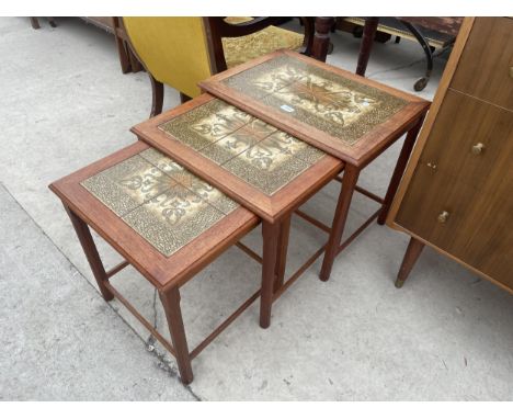A NEST OF THREE RETRO TEAK TABLES WITH INSET TILE TOP, STAMPED 'MADE IN DENMARK BY MOBELFABRIKKEN TOFTEN' 