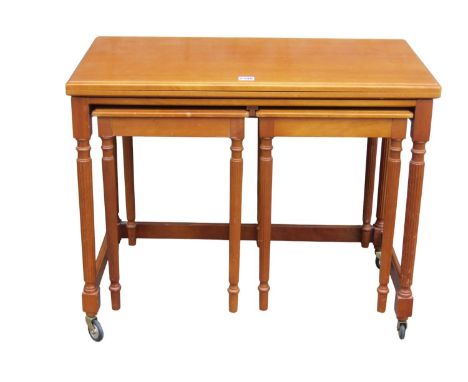 A small Victorian Davenport (af) together with a Macintosh nest of occasional tables (2) 