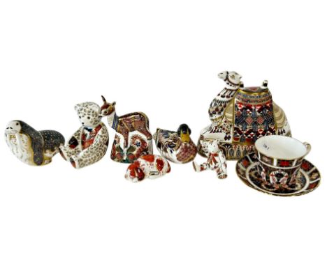 A collection of Royal Crown Derby figures (7) including a camel, a walrus, a fawn, a mallard and a puppy, all gold stoppered,