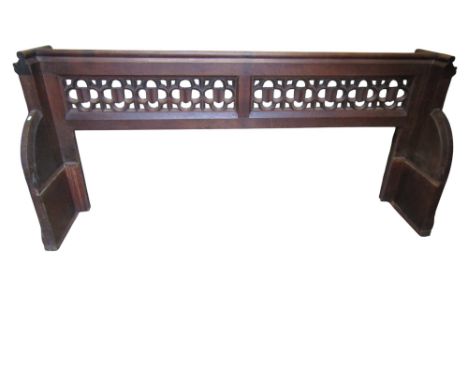 A gothic ecclesiastical oak pew back, with pierced back, 93cm high, 207 x 55cm.