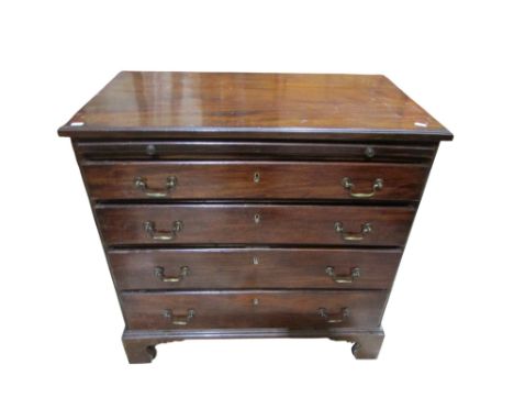 A Georgian mahogany chest of four long graduated drawers and brush slide, raised on bracket supports, oak lined, 88cm high x 
