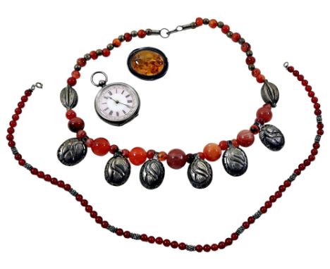 A small continental silver cased fob / pocket watch, with painted and gilded enamel dial, 35mm case, together a group of ambe