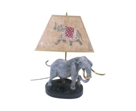 A table lamp in the form of an Indian Elephant with a decorated elephant shade 25cm wide. 