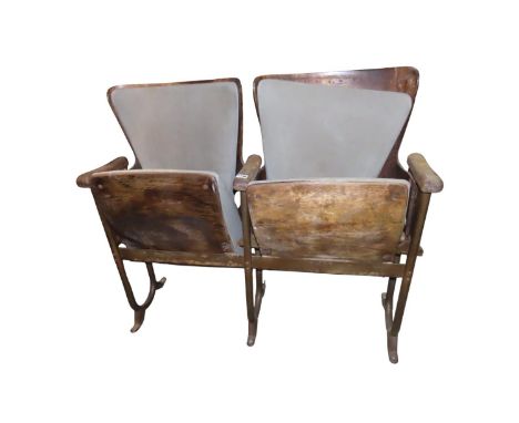 An Edwardian cinema/theatre/sporting venue/event chair duo, in fixed frame with sprung seats