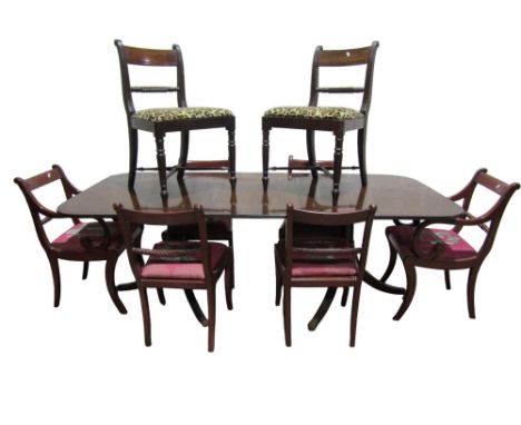 A reproduction Georgian twin pillar D end extending dining table on swept supports, 215cm long x 100cm wide, together with a 