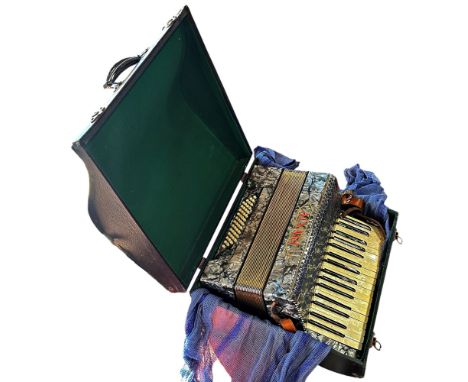 An Italian Alvari piano accordion with a silver pearlised casing with original case. 