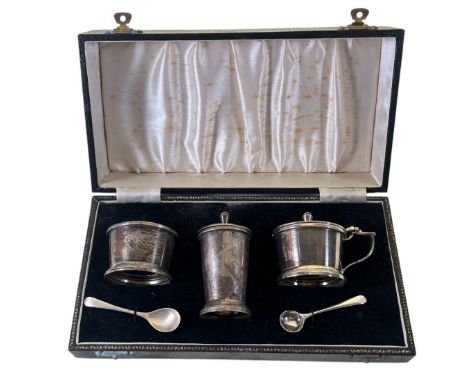 A cased set of six silver fruit knives and forks, Birmingham 1926, maker Docker &amp; Burn Ltd, and a cased silver condiment 