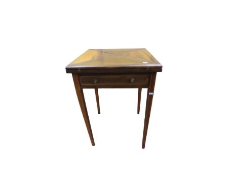 An Edwardian mahogany envelope card table with frieze drawer on square tapered legs, 76cm high x 55cm square
